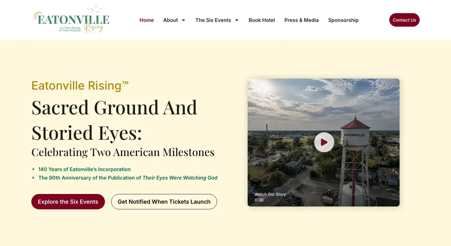Portada de Eatonville Rising: titular "Sacred Ground And Storied Eyes: Celebrating Two American Milestones", dos botones y un vídeo aéreo de la torre de agua de Eatonville